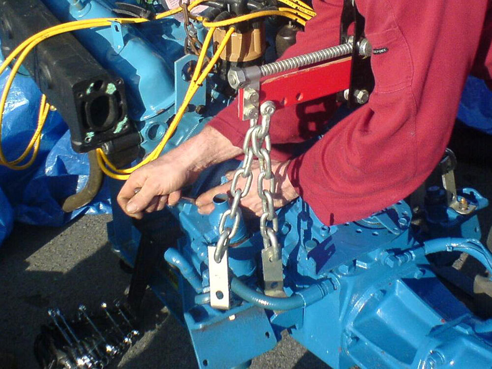 service crew fixing engine